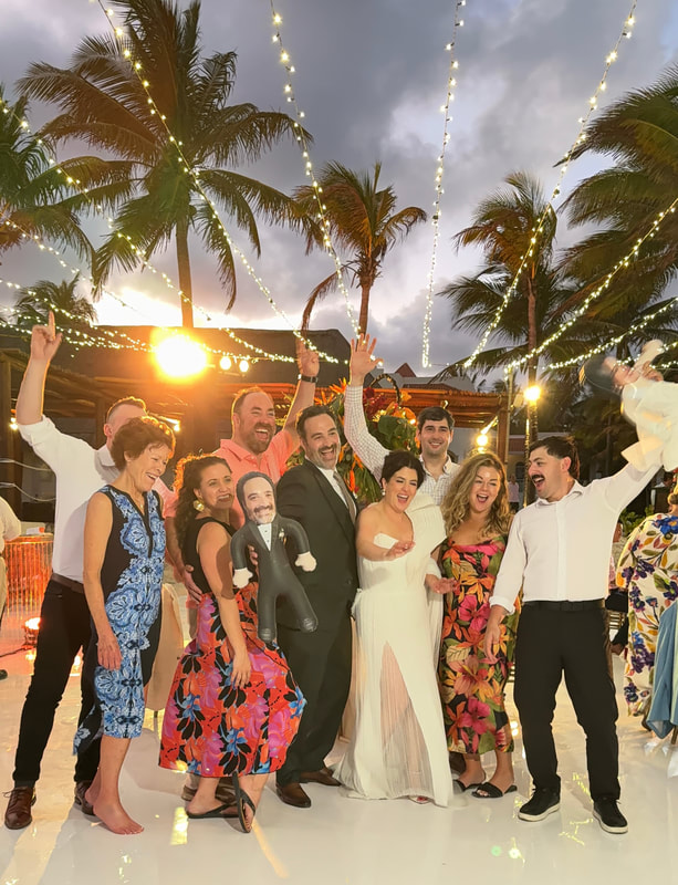 Destination wedding guests celebrating together